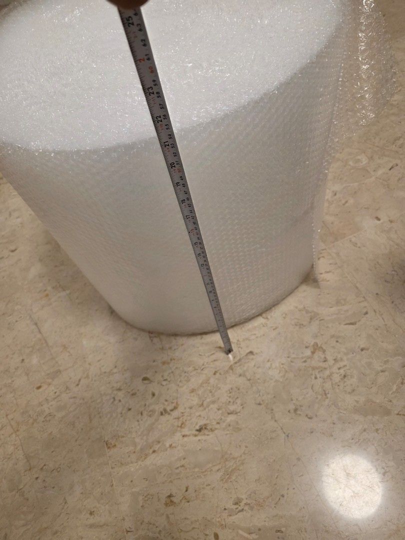 Bubble Wrap (Category: Home Improvement Tools & Accessories) located in Singapore. Submitted by man484 (Listing ID 1458689656, Image 3). Description: I have a big roll of Bubble wrap for sale. - Widdth is 54 cm. - I bought a full roll for moving and used onlya small portion. - Available for self collection from Upper East Coast Road - I am also selling other items, if interested, see my other listing's- boxes, wall clock, lamp, Wifi6 internet mes