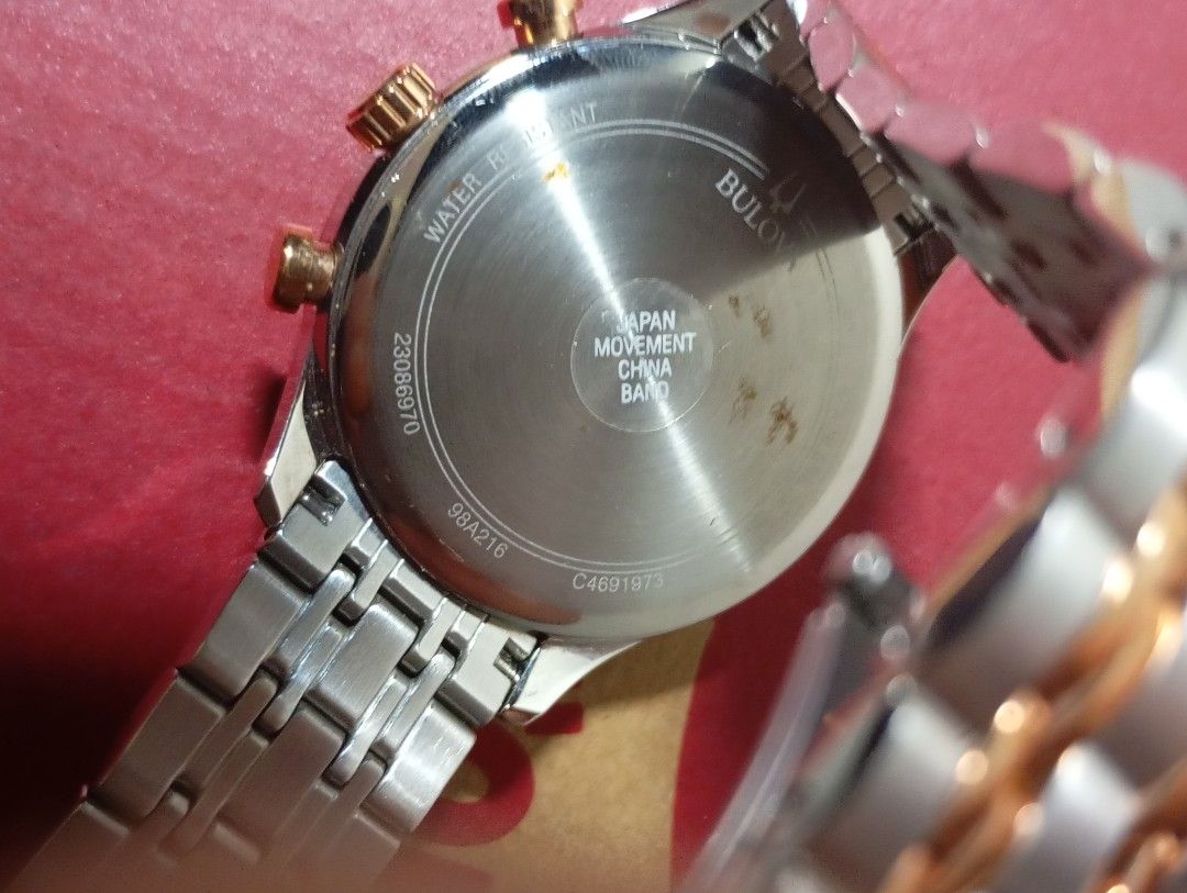 Bulova Chronograph Watch Two-Tone Stainless Steel (Category: Luxury Watches) located in Lapu Lapu. Submitted by rararockce65981 (Listing ID 1458864421, Image 1). Description: - Brand: Bulova - Style: Chronograph Watch - Band: Two-tone stainless steel with gold accents - Dial: Silver with sub-dials - Features: Water resistant - Movement: Japan Movement - Band Origin: China - Model Number: 98A216 - Serial Number: 23086970 - Case Number: C4691973 - 
