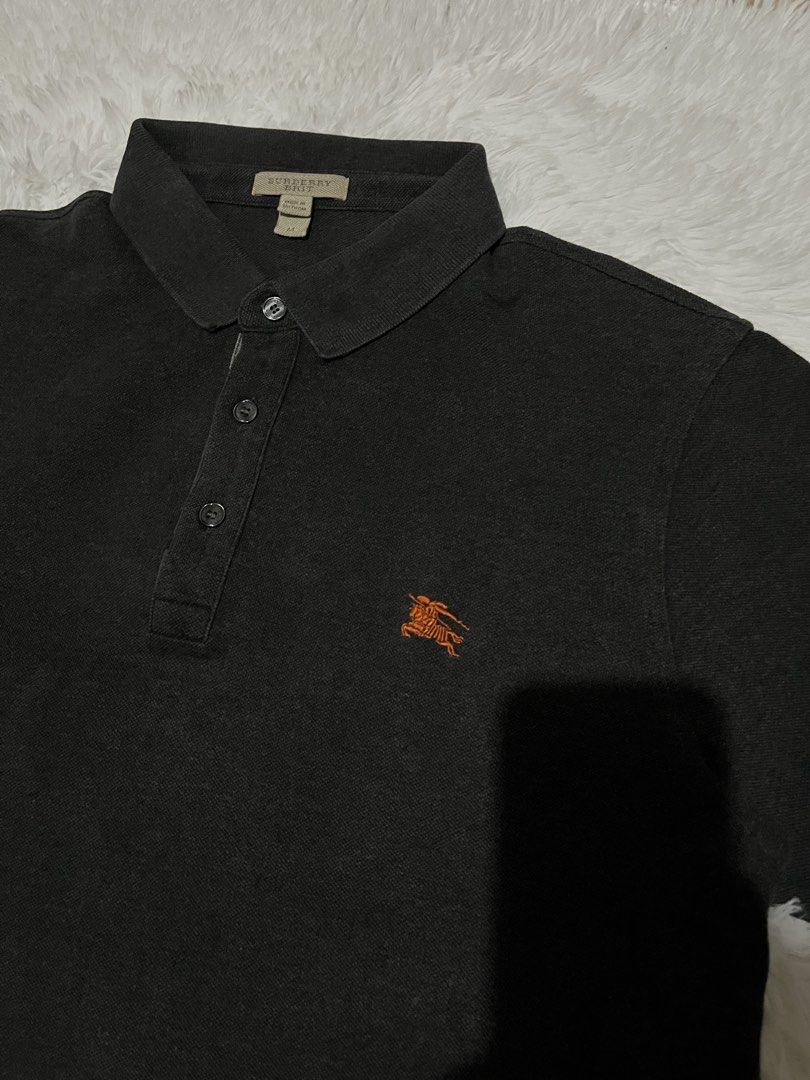 Burberry Brit Dark Grey (Category: Tshirts & Polo Shirts ) located in Manila. Submitted by reworn_dept (Listing ID 1458733469, Image 2). Description: Excellent Condition Color rate 9/10 Issue fold collar for safety Width 19 Length 26 🏷️ 400 FREE SHIPPING 📦 SHIPPING NATIONWIDE via J&T 🇵🇭 📍 Parañaque 1700.