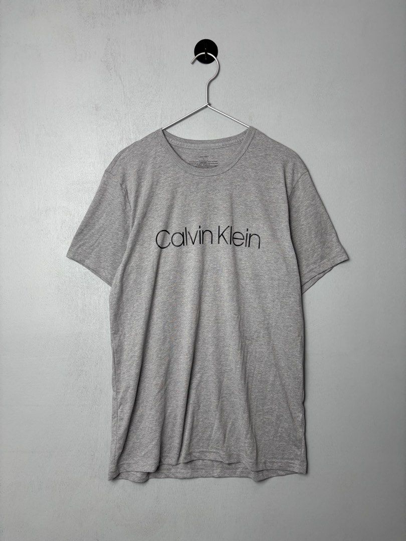 Calvin Klein Dri-Fit T-Shirt (Category: Activewear) located in Mandaluyong City. Submitted by fellas_ph (Listing ID 1458814394, Image 1). Description: Excellent condition No issues Size M 20" Width 28" Length.