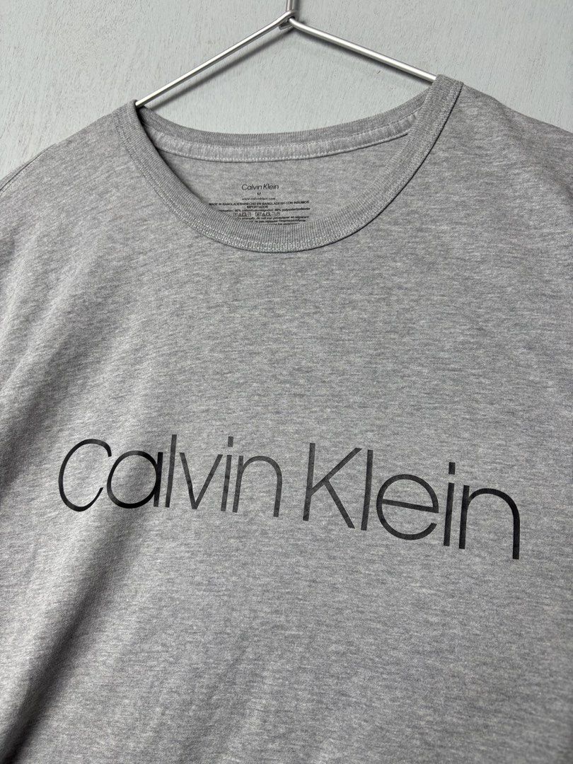 Calvin Klein Dri-Fit T-Shirt (Category: Activewear) located in Mandaluyong City. Submitted by fellas_ph (Listing ID 1458814394, Image 2). Description: Excellent condition No issues Size M 20" Width 28" Length.
