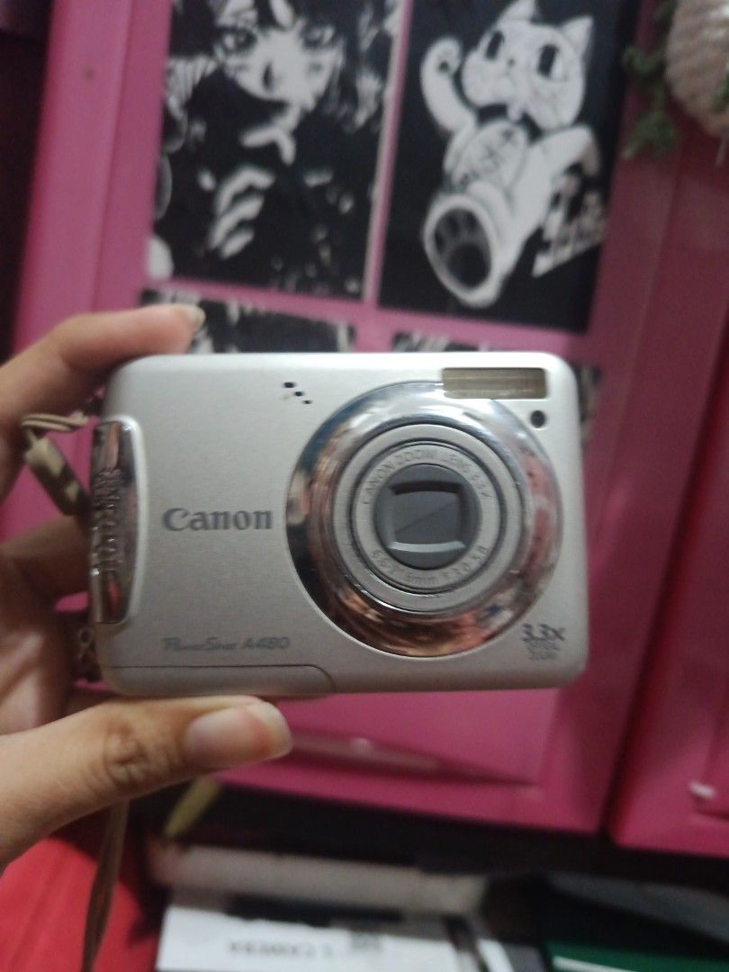 Canon PowerShot with issues (Category: Cameras) located in Muntinlupa City. Submitted by cham_porado15 (Listing ID 1458697226, Image 1). Description: - Silver Canon PowerShot A480 digital camera - Screen has visible scratches - Battery compartment shown open (batteries not included) - Buy at your own risk because all sales are final😭 issue : LCD Crisp MOP: JNT & Lalamove.
