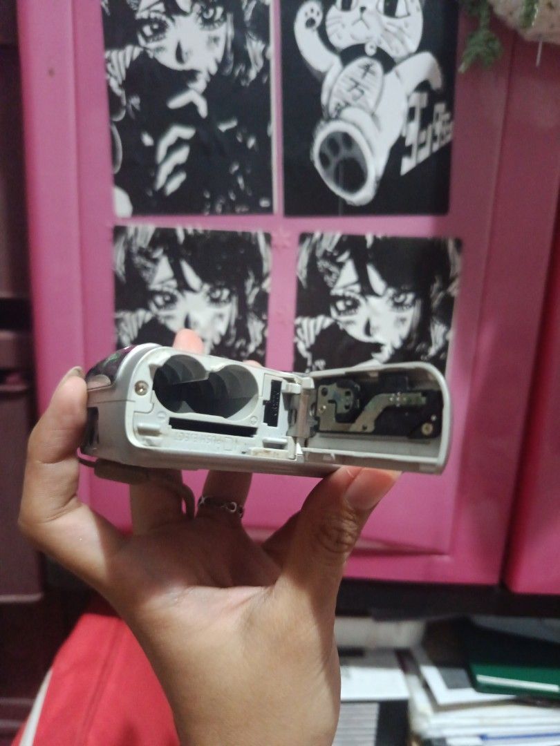 Canon PowerShot with issues (Category: Cameras) located in Muntinlupa City. Submitted by cham_porado15 (Listing ID 1458697226, Image 2). Description: - Silver Canon PowerShot A480 digital camera - Screen has visible scratches - Battery compartment shown open (batteries not included) - Buy at your own risk because all sales are final😭 issue : LCD Crisp MOP: JNT & Lalamove.