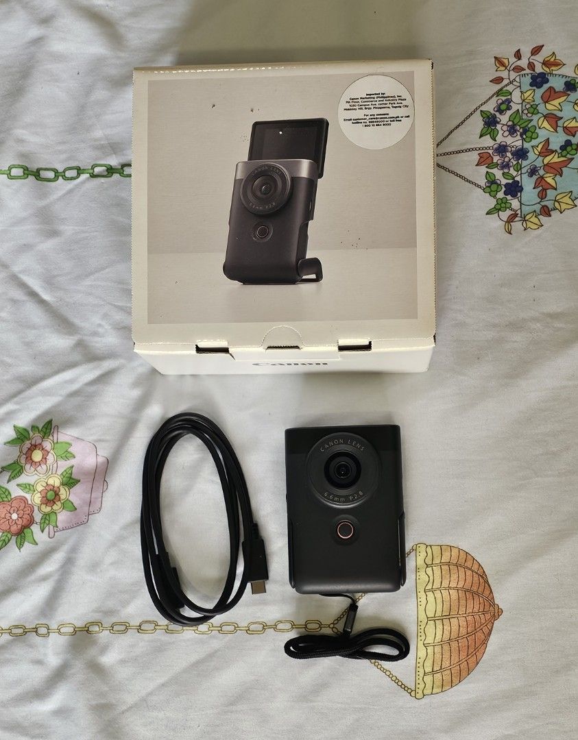 Canon Powershot V10 4K Vlogging, Mukbang Camera (Category: Cameras) located in Pasig City. Submitted by cookeydream (Listing ID 1458853453, Image 1). Description: - Canon Powershot V10 - In Mint Condition - Includes USB cable and original box - Compact and portable for on-the-go photography - Features a flip-out screen for easy viewing, wide view lens - Ideal for casual snapshots, vloggging mukbangs.
