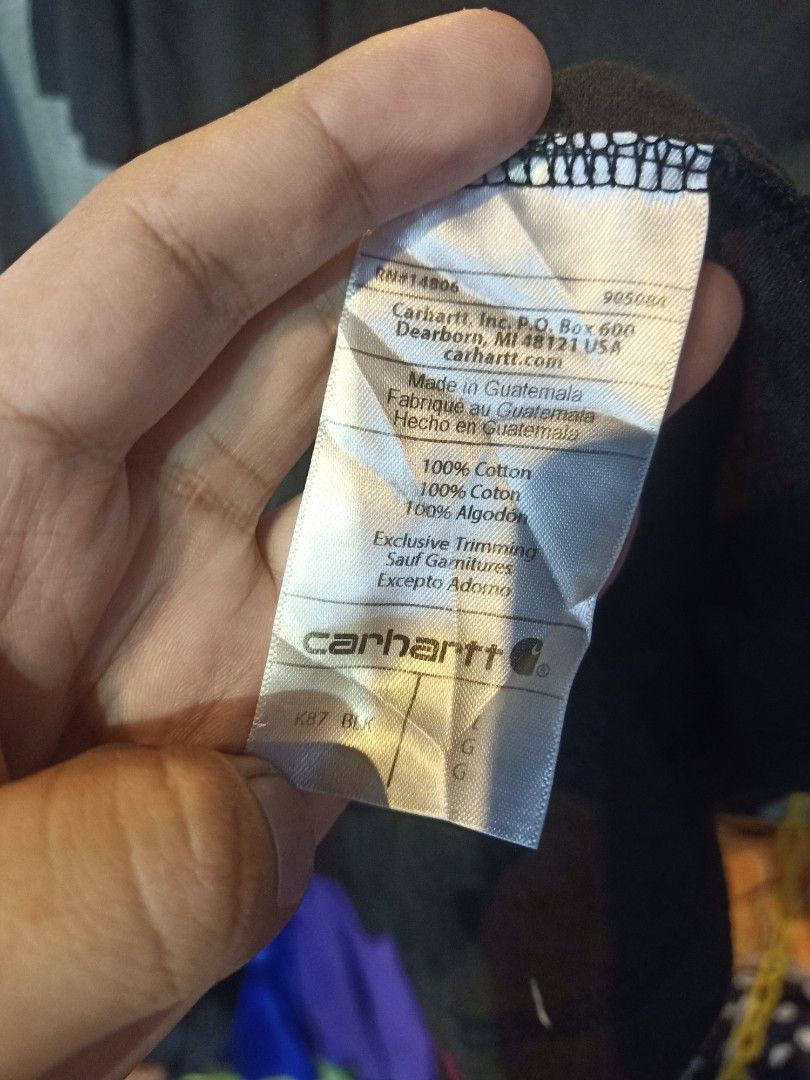 Carhartt T-Shirt Bundle - Black & Grey (Category: Tshirts & Polo Shirts ) located in Tagum. Submitted by tripthrift2026 (Listing ID 1458834968, Image 2). Description: - Bundle includes two Carhartt T-shirts. - Size: Large (L) - Color 1: Black with pocket and small logo. - Color 2: Grey with large 'CARHARTT' graphic on front. - Material: 100% Cotton - Perfect for casual and everyday wear..