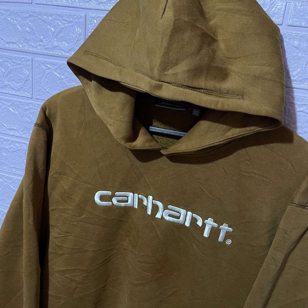 Carhartt Work In Progress Hooded Sweatshirt Brown Size L (Category: Coats, Jackets and Outerwear) located in Zamboanga. Submitted by selvege (Listing ID 1458710855, Image 2). Description: - Brown Carhartt hoodie - Size L - Embroidered Carhartt logo on front - Made from a comfortable cotton-polyester blend - Ideal for everyday casual wear - Please check photos for detailed condition.