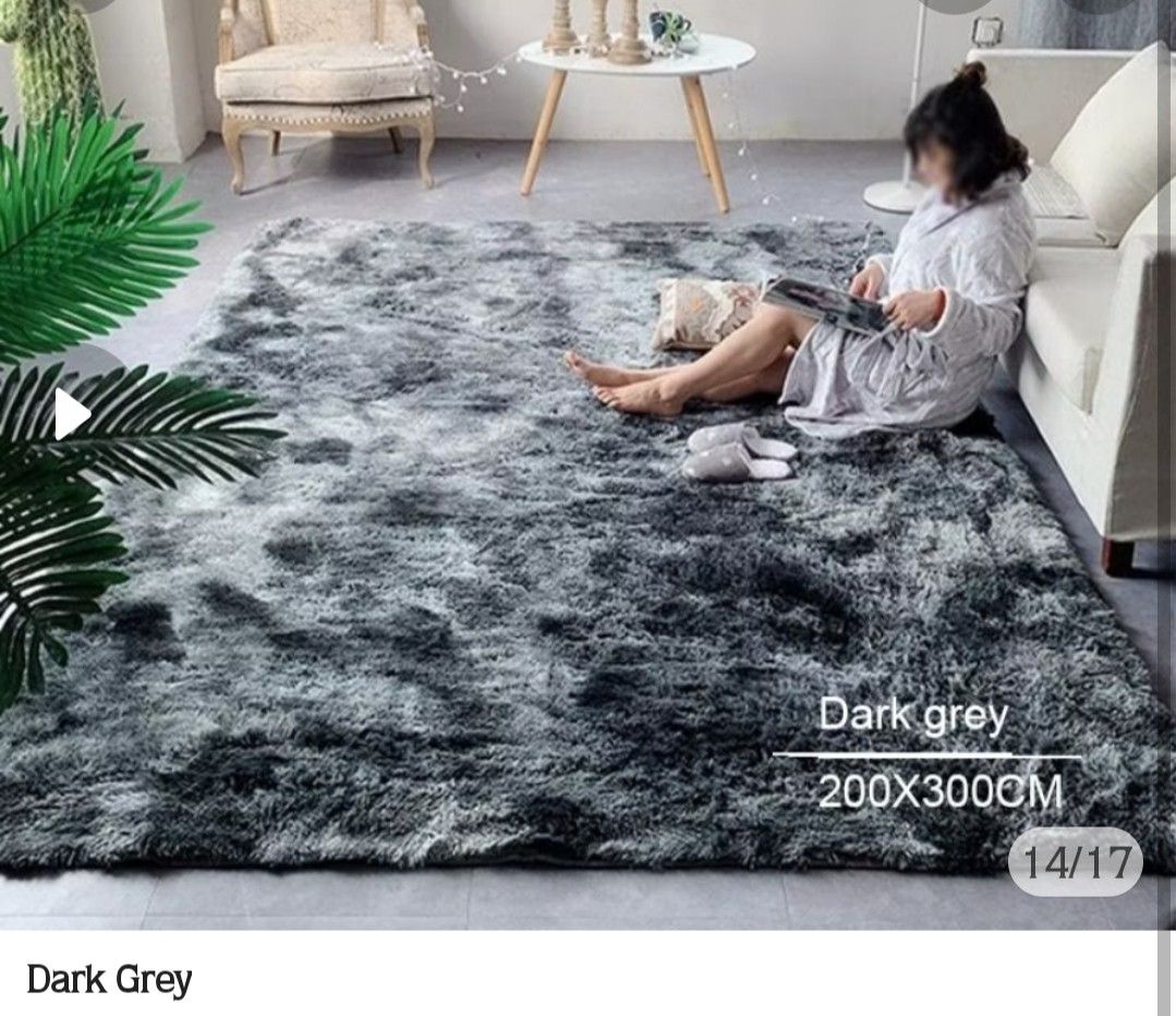 Carpet - Dark Grey Tie-Dye Fluffy Rug (Category: Carpets, Mats & Flooring) located in Quezon City. Submitted by ladytaurus87416 (Listing ID 1458728408, Image 1). Description: - Super soft and fluffy texture - Stylish dark grey tie-dye pattern - Generous size: 200x200cm - Ideal for living rooms or bedrooms - Creates a cozy and inviting atmosphere - Easy to maintain and clean.