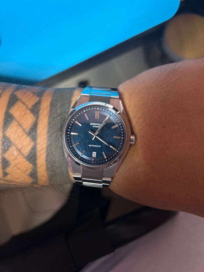Casio Edifice EFK-100D (Category: Men's Watches) located in Caloocan City. Submitted by mikeg03 (Listing ID 1458730492, Image 2). Description: - Casio Edifice Automatic Watch - Striking blue dial with a convenient date window - Durable stainless steel bracelet for a classic look - Designed for comfortable everyday wear - Looks great on the wrist, adding a touch of style - Feel free to ask any questions! Anyone willing to swap? Swapping my EFK 100