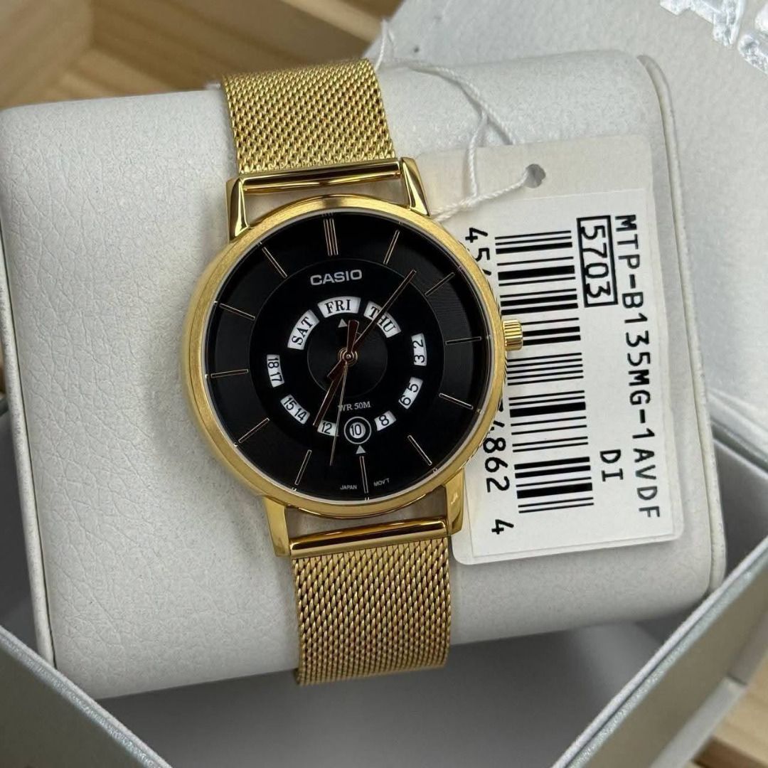 Casio MTP-B135M6-1AVDF Gold Mesh Watch (Category: Men's Watches) located in Caloocan City. Submitted by cha_essentials2026 (Listing ID 1458829770, Image 1). Description: - Gold Casio watch - Black dial - Day and date display - Adjustable mesh strap - Water resistant 50m - Includes original box - Perfect for daily wear or special occasions.