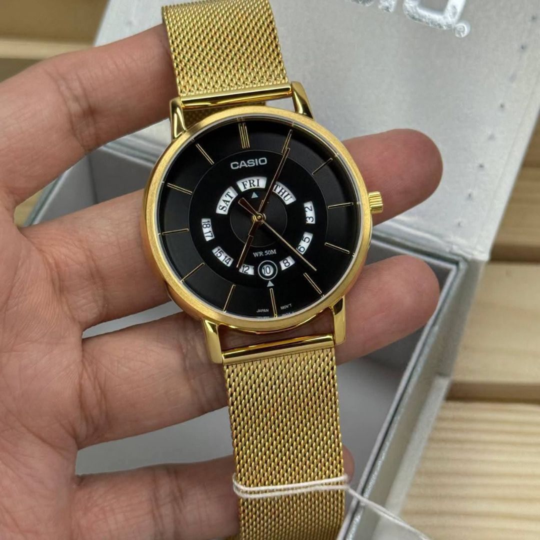 Casio MTP-B135M6-1AVDF Gold Mesh Watch (Category: Men's Watches) located in Caloocan City. Submitted by cha_essentials2026 (Listing ID 1458829770, Image 3). Description: - Gold Casio watch - Black dial - Day and date display - Adjustable mesh strap - Water resistant 50m - Includes original box - Perfect for daily wear or special occasions.