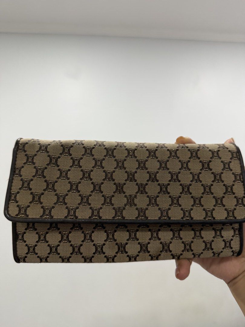 Celine Monogram Canvas long wallet (Category: Luxury Bags & Wallets) located in Manila. Submitted by ejamescatorce (Listing ID 1458690822, Image 1). Description: -Vintage celine triomphe wallet -canvass.