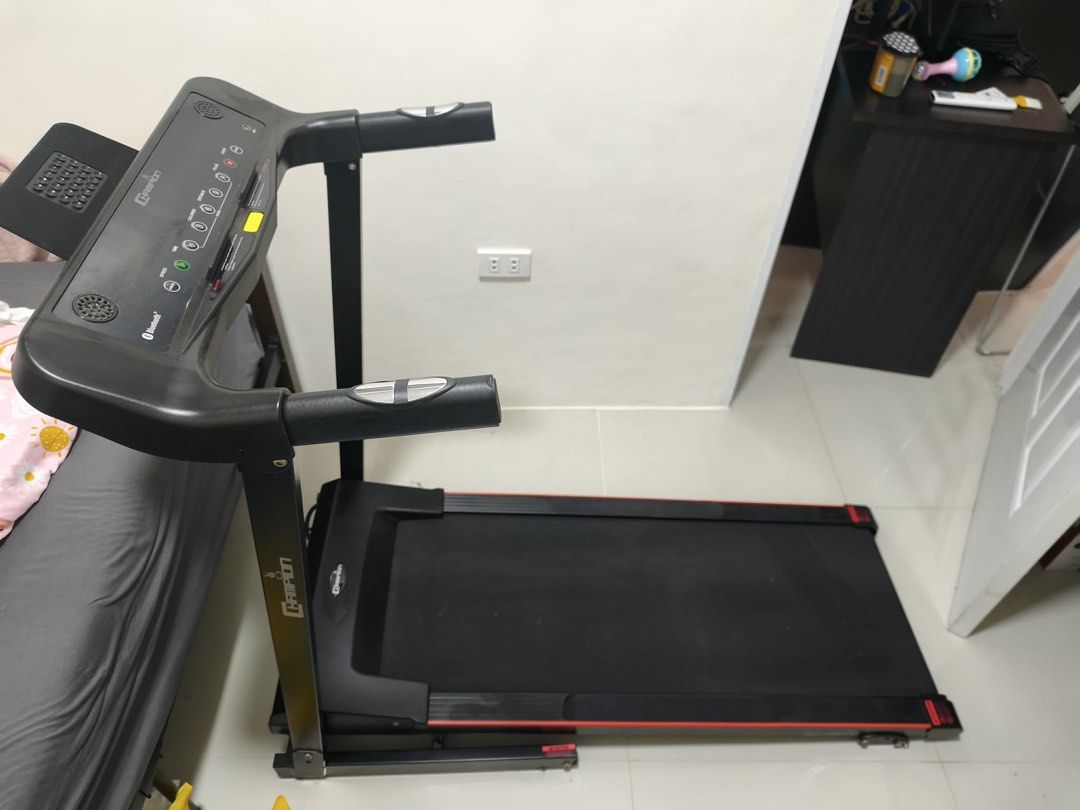 Champion Treadmill with Bluetooth (Category: Cardio & Fitness Machines) located in Manila. Submitted by gonchrist63981 (Listing ID 1458798373, Image 2). Description: - Champion brand treadmill - Bluetooth connectivity - Multiple speed and program settings - Folds up for easy storage - Ideal for home workouts - In excellent working condition REASON FOR SELLING: ‘di po siya nagagamit kasi nabuntis po yung may ari after mabili and busy na rin sa wor