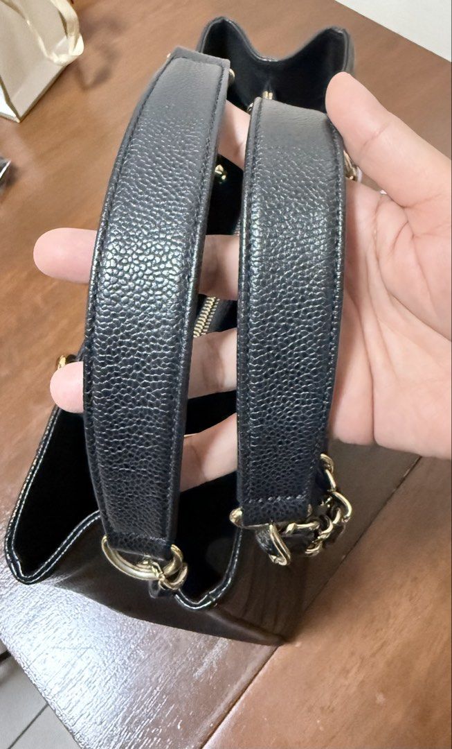Chanel Black Caviar GST (Category: Luxury Bags & Wallets) located in Taguig. Submitted by bianca625 (Listing ID 1458723672, Image 3). Description: - Authentic Chanel tote bag - Material: Black caviar leather - Features: Classic quilting, gold chain straps - Includes: Dust bag, Entrupy certificate of authenticity.