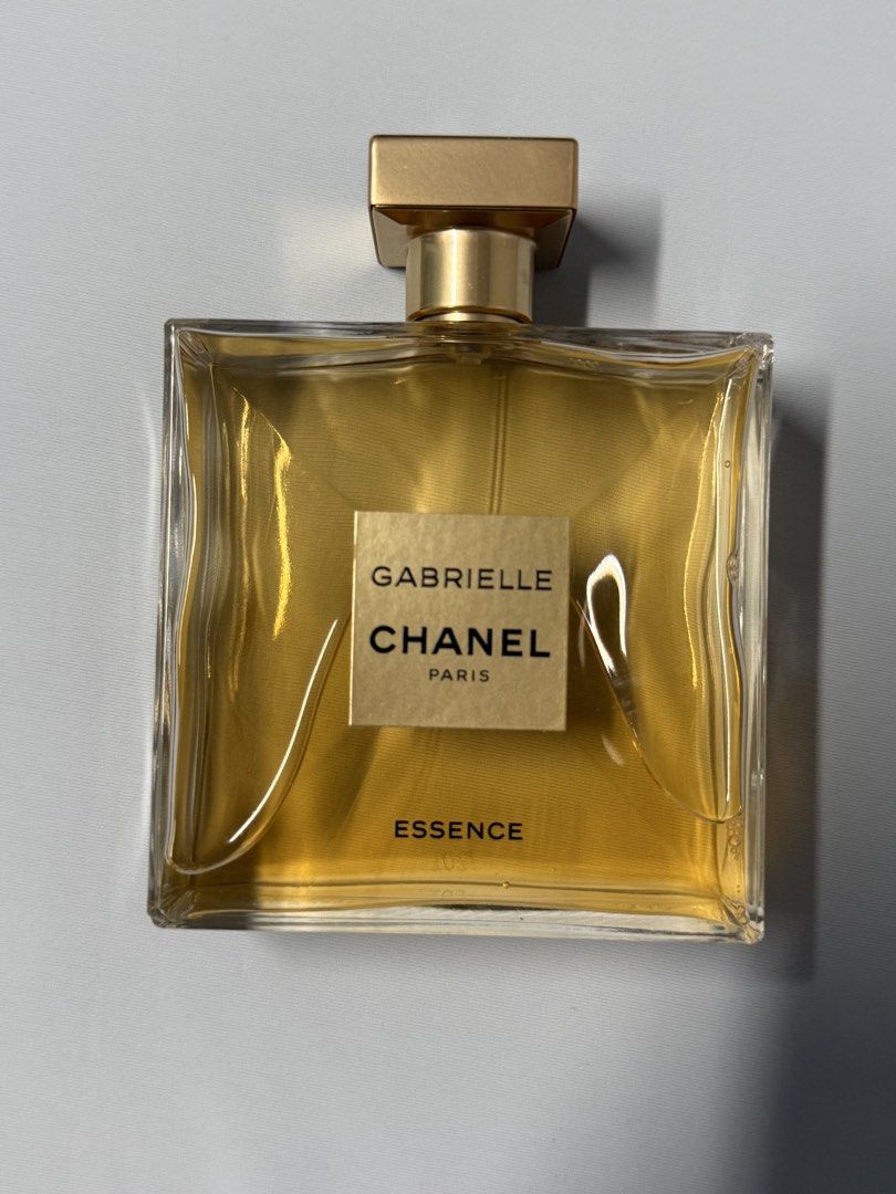 Chanel Gabrielle Essence Eau de Parfum 100ml 10/8 (Category: Fragrance & Deodorants) located in Manila. Submitted by richru (Listing ID 1458839404, Image 3). Description: Buy from HK 100% original No receipt - Chanel Gabrielle Essence Perfume - 100ml bottle - Scent: Floral and Woody - Versatile: Great for everyday or special occasions - Bottle: Clear glass with a gold cap - Condition: Plenty of product remaining.