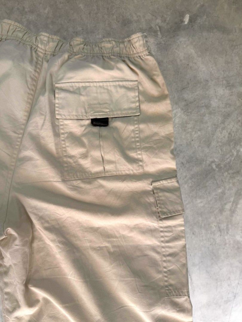 Classic Garterized Waist Cargo Shorts (Category: Shorts) located in Manila. Submitted by closetfiles.ph (Listing ID 1458714762, Image 3). Description: Classic Garterized Waist Cargo Shorts Brand: N/A Code: CJ009 Color: Beige Size: - length: 25.5 in - width: 14-16 in Condition: 9/10 Defect: ⚠️ Minor stain (removable).
