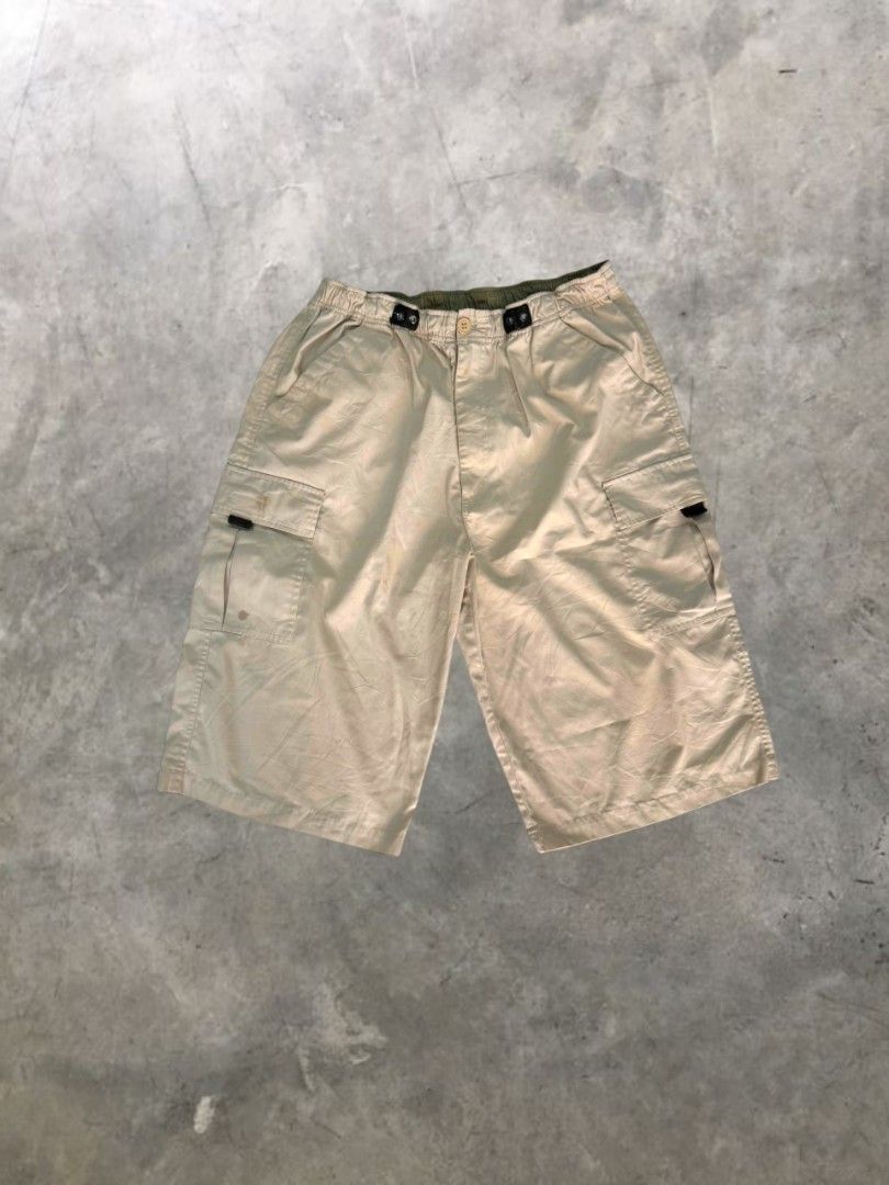 Classic Garterized Waist Cargo Shorts (Category: Shorts) located in Manila. Submitted by closetfiles.ph (Listing ID 1458714762, Image 1). Description: Classic Garterized Waist Cargo Shorts Brand: N/A Code: CJ009 Color: Beige Size: - length: 25.5 in - width: 14-16 in Condition: 9/10 Defect: ⚠️ Minor stain (removable).
