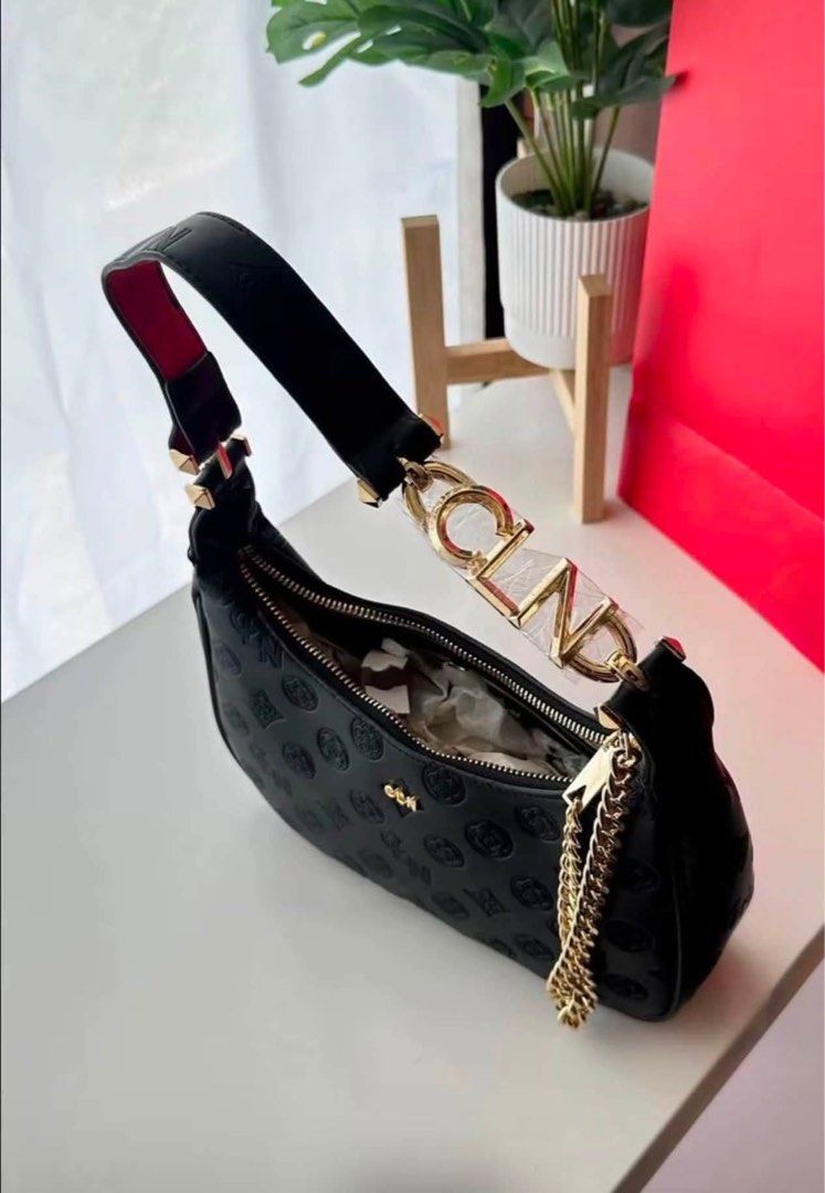 CLN Sherah Shoulder Bag (Category: Shoulder Bags) located in Manila. Submitted by r2luxe (Listing ID 1458840809, Image 3). Description: A chic shoulder bag featuring an embossed monogram finish and a striking rose gold-tone chain accent. ✨ Available in different colors and designs so you can choose the style that suits you best! 💌 Message us to order or inquire..