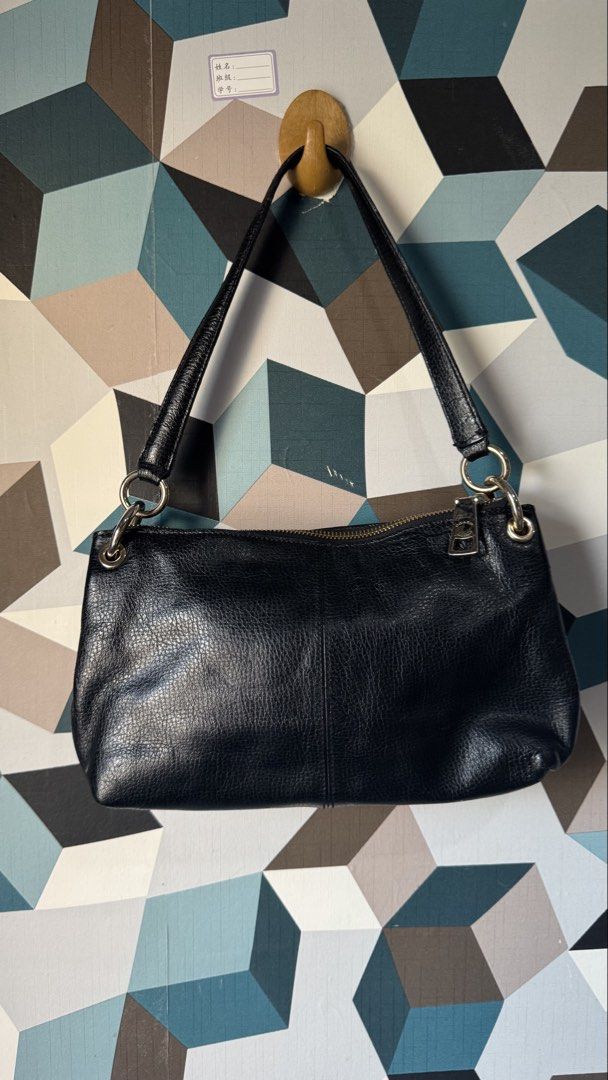 Coach Black Leather Shoulder Bag with Embossed Logo (Category: Luxury Bags & Wallets) located in Cebu City. Submitted by mochywony (Listing ID 1458882773, Image 2). Description: COACH black leather shoulder embossed horse and carriage P2100 FREE SF LAYAWAY OPTION: 30% dp, 3 weeks to pay (price is fixed) Price negotiable if full payment Guaranteed Authentic / Original Bag Condition: Rank AB - Great - no rubs, no cracks, no holes - Leather dryness 