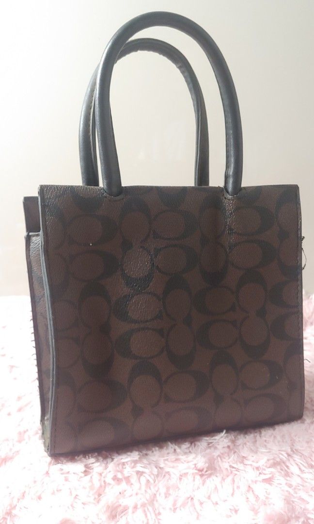Coach mini hand bag (Category: Luxury Bags & Wallets) located in Kitaotao. Submitted by wilddolphin.0a0db3 (Listing ID 1458872323, Image 3). Description: coach mini hand bag Excellent condition need wash note❎not authentic. but complete tags ..