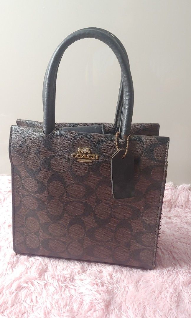 Coach mini hand bag (Category: Luxury Bags & Wallets) located in Kitaotao. Submitted by wilddolphin.0a0db3 (Listing ID 1458872323, Image 1). Description: coach mini hand bag Excellent condition need wash note❎not authentic. but complete tags ..