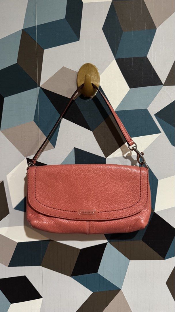 Coach Pink Leather Clutch Bag with Strap (Category: Luxury Bags & Wallets) located in Cebu City. Submitted by mochywony (Listing ID 1458884986, Image 1). Description: COACH Park Pebbled Leather Large Flap Wristlet P3300 LAYAWAY OPTION: 30% dp, 3 weeks to pay (price is fixed) Price negotiable if full payment Guaranteed Authentic / Original Bag Condition: Rank A - Excellent - no rubs, no cracks, no holes - Has stains - Hardware tarnish Comment “Min