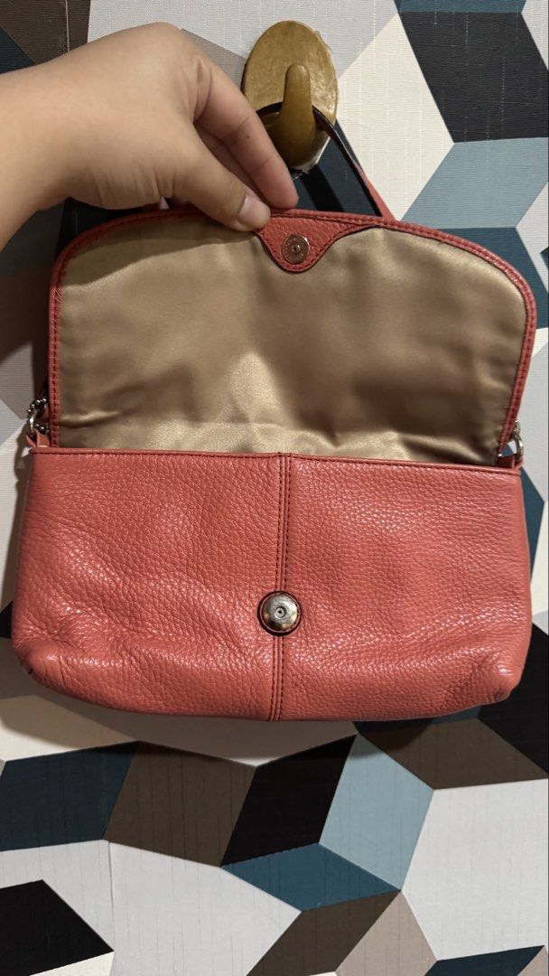 Coach Pink Leather Clutch Bag with Strap (Category: Luxury Bags & Wallets) located in Cebu City. Submitted by mochywony (Listing ID 1458884986, Image 2). Description: COACH Park Pebbled Leather Large Flap Wristlet P3300 LAYAWAY OPTION: 30% dp, 3 weeks to pay (price is fixed) Price negotiable if full payment Guaranteed Authentic / Original Bag Condition: Rank A - Excellent - no rubs, no cracks, no holes - Has stains - Hardware tarnish Comment “Min