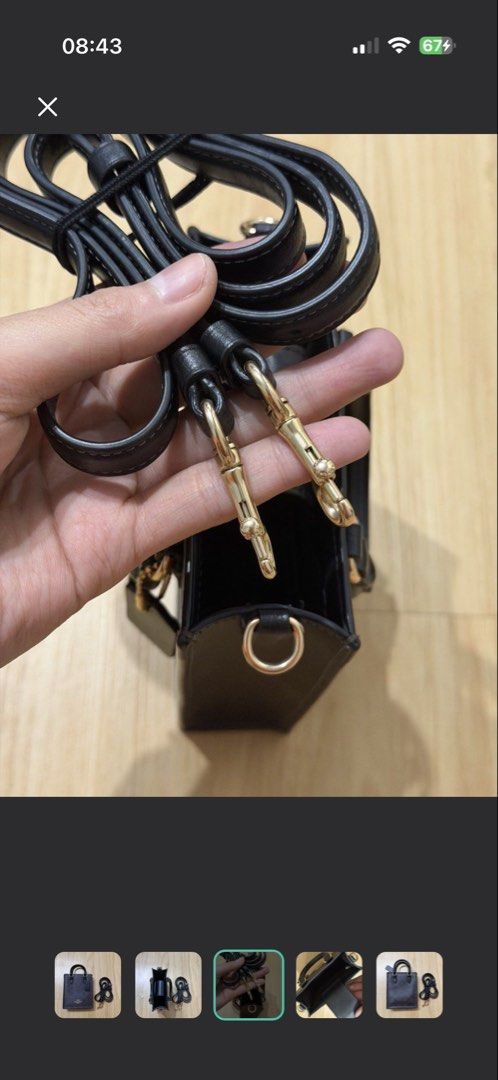 Coach Signature Mini Tote Bag with Strap (Category: Luxury Bags & Wallets) located in Los Banos. Submitted by chezka024 (Listing ID 1458692108, Image 3). Description: - Coach mini tote bag - Signature print - Detachable crossbody strap included - Gold hardware details - Interior card slot - Clean inside and out - Versatile for everyday or evening use.