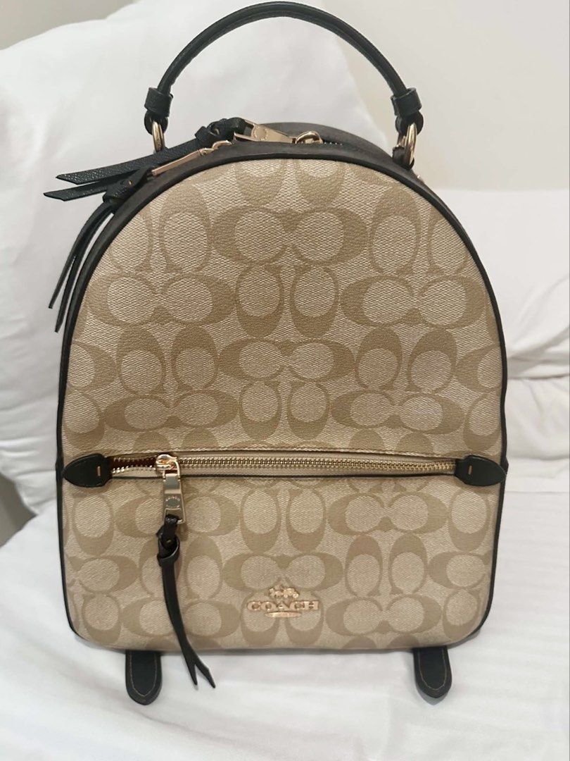 Coach Jordyn Backpack Signature Pattern Purse Light Khaki Brown Multi (C2002) (Authentic) (Hard to Find) (Category: Luxury Bags & Wallets) located in Pasay City. Submitted by lightyellowcheesecake (Listing ID 1458734106, Image 1). Description: Crossposted on Fb Can Meet-up at Mall of Asia Conrad Inclusions: Original Tags Coach Outlet Guaranteed Authentic, Slightly Negotiable Original Price: 450 USD rfs: need funds, not into backpacks anymore Bank