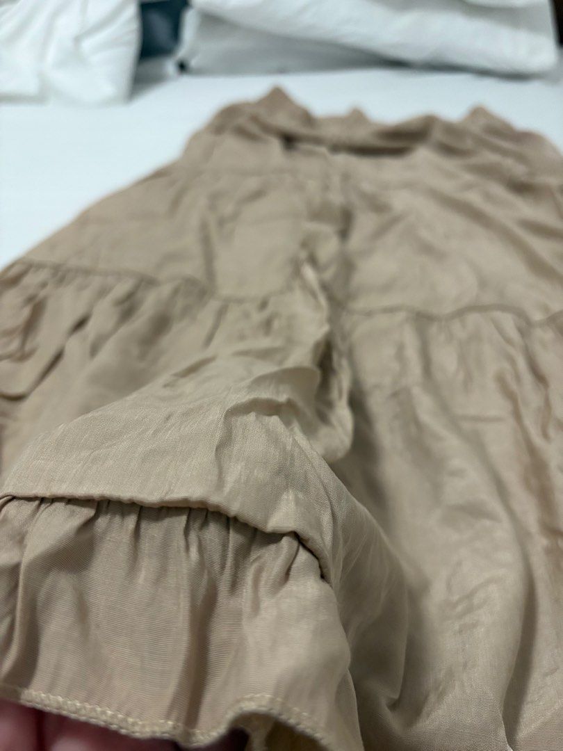COCO CABANA Tiered Maxi Skirt - Beige (Category: Skirts) located in Las Pinas. Submitted by kulotszky (Listing ID 1458691098, Image 3). Description: - Beige tiered maxi skirt - Comfortable elastic waistband - Elegant ruffle hem detail - Flowy and lightweight fabric - Versatile for casual or dressed-up occasions Laamove/Grab.