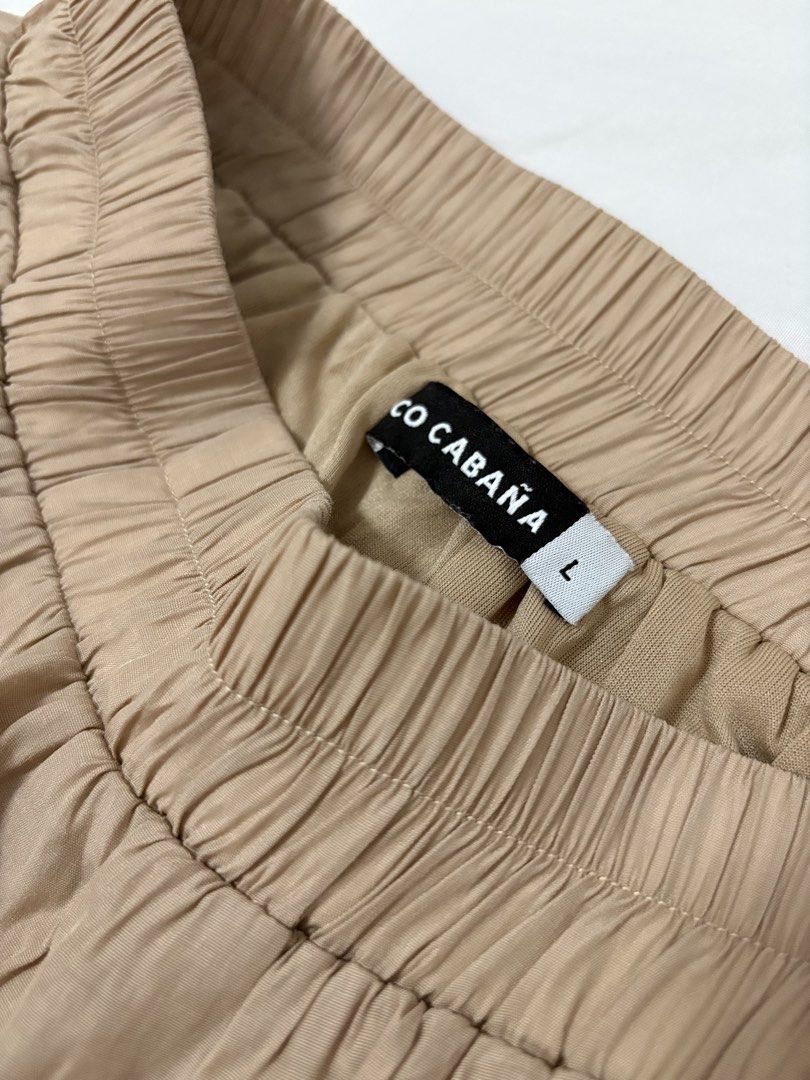 COCO CABANA Tiered Maxi Skirt - Beige (Category: Skirts) located in Las Pinas. Submitted by kulotszky (Listing ID 1458691098, Image 2). Description: - Beige tiered maxi skirt - Comfortable elastic waistband - Elegant ruffle hem detail - Flowy and lightweight fabric - Versatile for casual or dressed-up occasions Laamove/Grab.