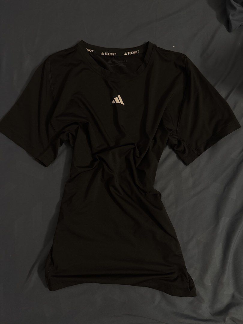 Compression Tee (Category: Activewear) located in Singapore. Submitted by vintageflava (Listing ID 1458793510, Image 1). Description: Never wore it as much since it was an impulse buy.