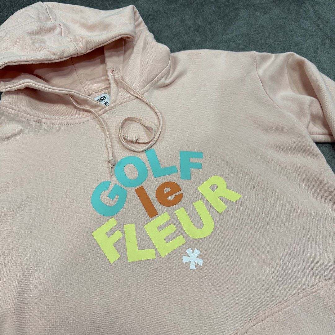 CONVERSE x GOLF LE FLEUR HOODIE (Category: Coats, Jackets and Outerwear) located in Santa Maria. Submitted by rarefindslt (Listing ID 1458885572, Image 3). Description: CONVERSE x GOLF LE FLEUR HOODIE (SWIPE LEFT FOR MORE DETAILS..) OFF/LEGIT best fit to L-XL dimes in solid pink color condition color rate! with adjustable string, front script logo design, front pockets, solid good condition rate! can pass as new! .