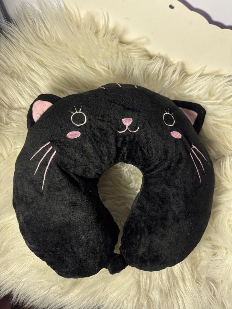 Cute Character Neck Pillow for Travel (Category: Bedding & Towels) located in Quezon City. Submitted by Solanawear (Listing ID 1458751414, Image 3). Description: - Super soft neck pillows for ultimate comfort. - Available in 3 adorable designs: blue character, sleeping white cat, and black cat. - Ideal for long journeys, flights, car rides, or simply relaxing. - Makes a fun and practical gift for friends and family..