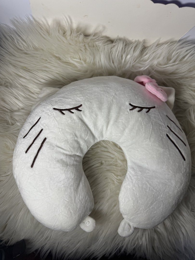 Cute Character Neck Pillow for Travel (Category: Bedding & Towels) located in Quezon City. Submitted by Solanawear (Listing ID 1458751414, Image 2). Description: - Super soft neck pillows for ultimate comfort. - Available in 3 adorable designs: blue character, sleeping white cat, and black cat. - Ideal for long journeys, flights, car rides, or simply relaxing. - Makes a fun and practical gift for friends and family..