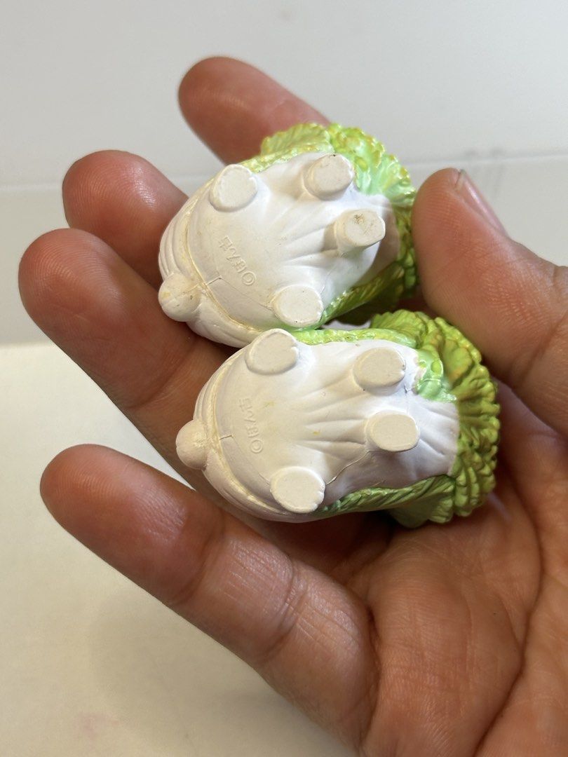 Cute Dog Vegetable Figurines sold per piece (Category: Other Home Decor) located in Pasig City. Submitted by mariel_candy (Listing ID 1458869776, Image 2). Description: Cute dog figurines resembling cabbage/lettuce. Small, collectible, and perfect for desk decor. Features Chinese characters on the bottom. Sold as a pair..