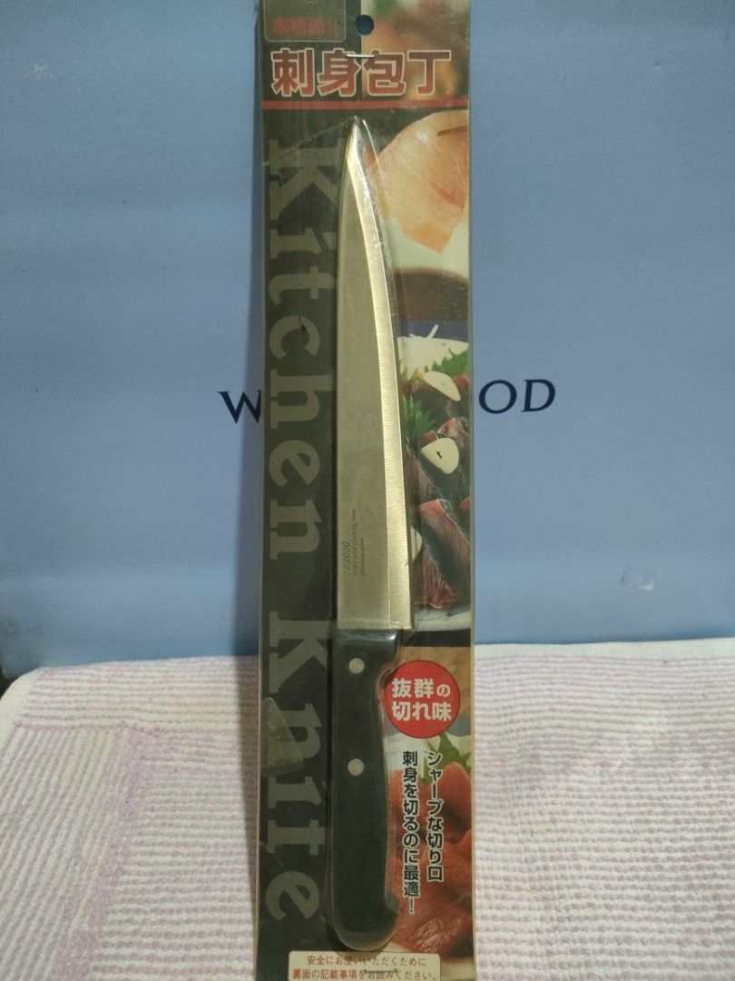Daiso Japan Kitchen Knife Sashimi Knife (Category: Knives & Chopping Boards) located in Bulacan. Submitted by hunterherojapanjdm (Listing ID 1458790472, Image 1). Description: - Sashimi Kitchen Knife from Daiso Japan - Durable stainless steel blade - Comfortable polypropylene handle - Ideal for slicing fish and other ingredients - Ergonomic grip for ease of use - Care instructions: Keep dry after washing to prevent rust - Origin: Made in China.