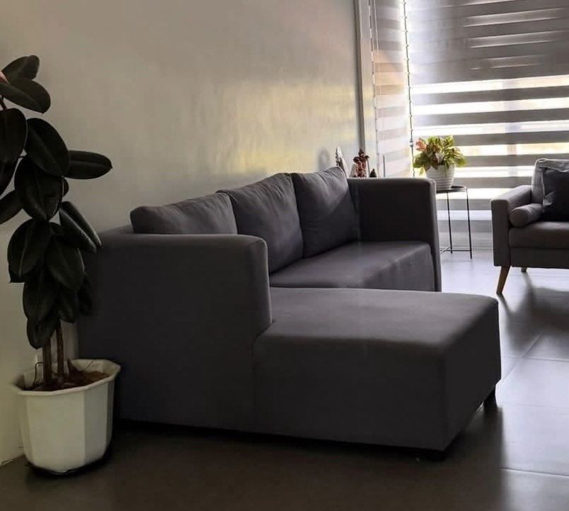 Dark Grey L-Shaped Sectional Sofa with Chaise (Category: Sofas) located in Indang. Submitted by lui0519 (Listing ID 1458745964, Image 1). Description: - Comfy L-shaped sectional sofa - Upholstered in dark grey fabric - Includes chaise lounge for extra relaxation - Perfect for living rooms or larger spaces - Seats multiple people comfortably - Easy to clean fabric.