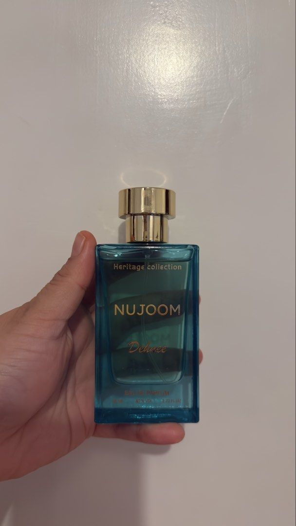 Dehnee Nujoom Eau de Parfum Perfume 100ml (Category: Fragrance & Deodorants) located in Valencia. Submitted by vraorng (Listing ID 1458809794, Image 2). Description: - NUJOOM Deluxe Eau de Parfum by Dehnee - 100ml / 3.37 FL.OZ size - Natapon ko na yung box :( replacement box nalang po. Nujoom is a fragrance for those who embrace life's energy and vibrancy. It starts with a vibrant mix of grapes and black currant, delivering a bold and fruity fres