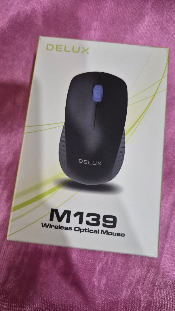 DELUX M139 Wireless Optical Mouse (Category: Mouse & Mousepads) located in Manila. Submitted by fastdragon_0c367e (Listing ID 1458790918, Image 2). Description: - php 499 original price, selling for php 300 - DELUX M139 Wireless Optical Mouse - Reliable nano receiver for easy setup - Smooth 1200 DPI optical tracking - Ergonomic design - Compatible with Windows and Mac OS - Comes with one AA battery included.