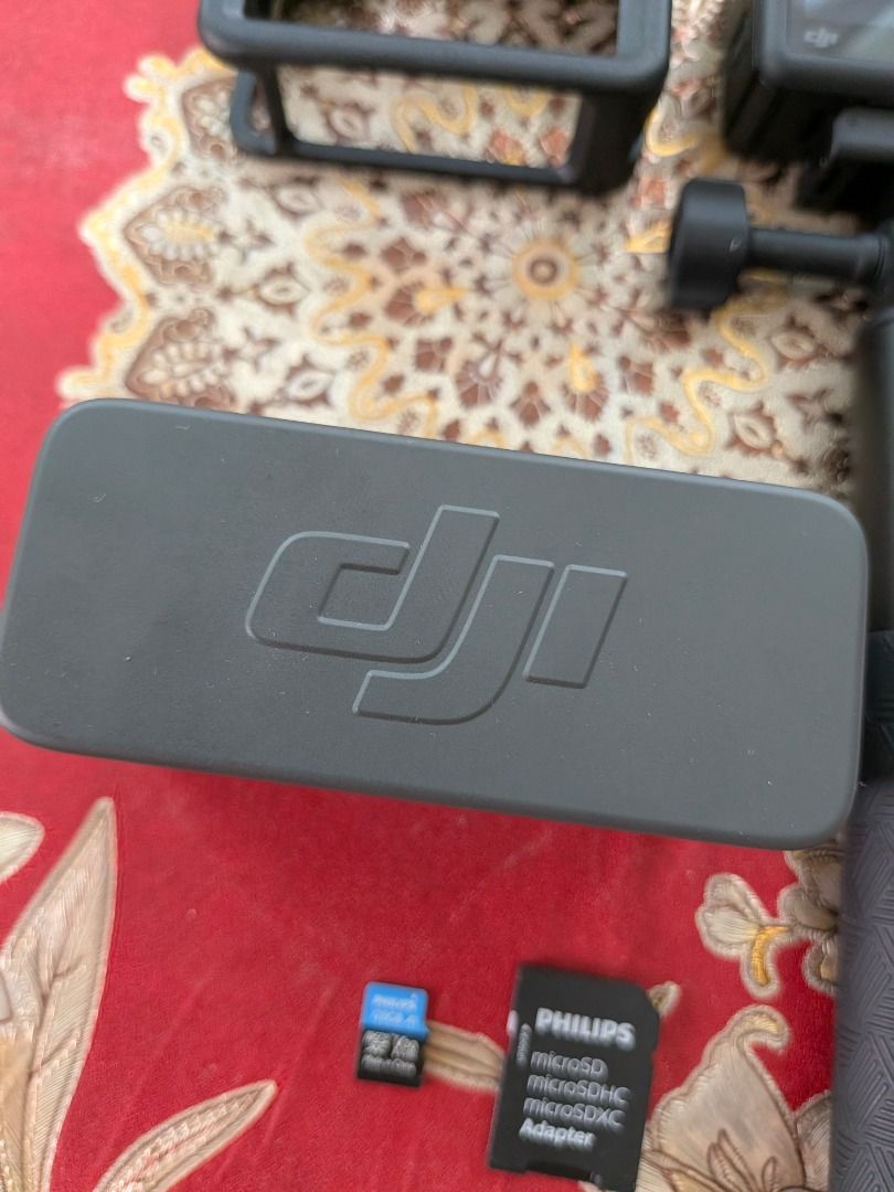 DJI Action 4 Camera with Accessories (Category: Cameras) located in Caloocan City. Submitted by peterlp1981 (Listing ID 1458738891, Image 2). Description: Kumpletong vlogging at action camera setup! Sobrang alaga at walang issue. Sulit na sulit para sa travel, motovlog, o underwater shoots. ​Kasama sa Set: • DJI Osmo Action 4 Camera na may Frame at Extension Stick • DJI Mic 2 Wireless Microphone System na may Charging Case • 2 ND Filters at 1 CPL
