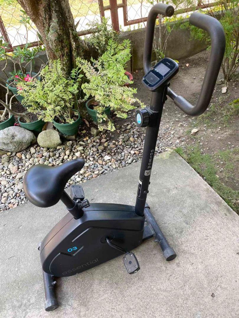 DOMYOS Essential Exercise Bike (Category: Bicycles) located in Tacurong. Submitted by ajpern (Listing ID 1458725925, Image 3). Description: Product Details: *Seat: Adjustable height *Smooth pedalling: 3 kg flywheel *Coaching: console (battery-powered) with 4 functions (calories, distance, duration, speed) *Durability: manual resistance, 8 levels *Condition: Used, but visually appears good/usable with some normal wear *Best for: Home cardio, light