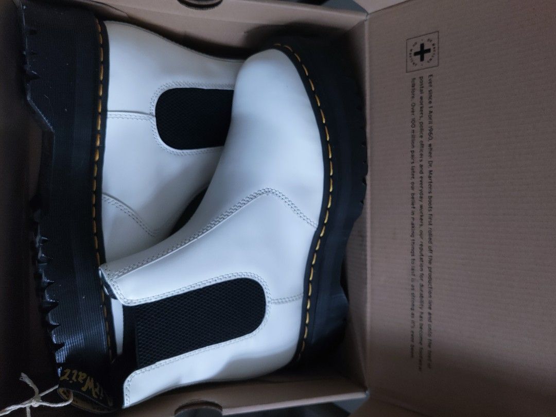 Dr. Martens 2976 Quad White Chelsea Platform Boots (Category: Boots) located in Makati City. Submitted by trevarucci (Listing ID 1458857778, Image 2). Description: Orig price : P14,000 - Dr. Martens 2976 Quad Chelsea Boots – White Smooth Leather Size: EU 43 / US Men's 10 A classic Dr. Martens silhouette elevated with the iconic Quad platform sole. Crafted from premium white Smooth leather with elastic side gussets for easy pull-on wear. Features 