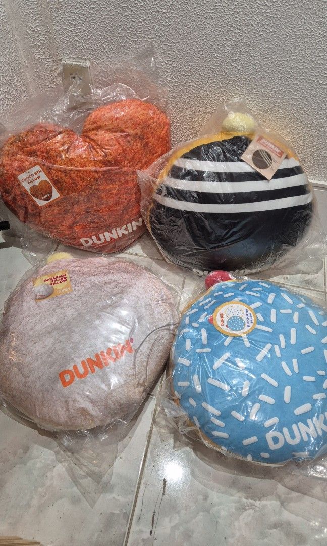 Dunkin Donuts Pillows (Category: Bedding & Towels) located in Baguio. Submitted by declutterist.2600 (Listing ID 1458785678, Image 1). Description: 3500 set 4 pillows Boston Kreme Chocobutternut Heart Bavarian Blue Chapter.