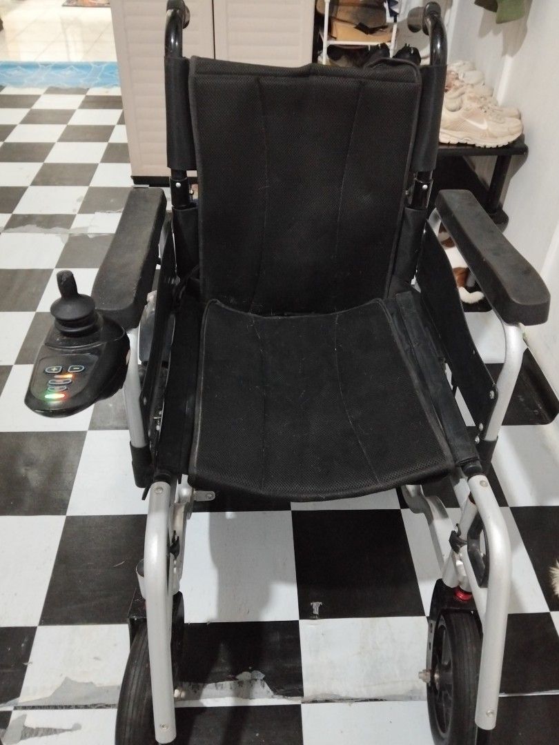 Electric wheel chair (Category: Caregiving Services) located in Abucay. Submitted by zealtree.b8f60f (Listing ID 1458810485, Image 2). Description: good as new 😊.