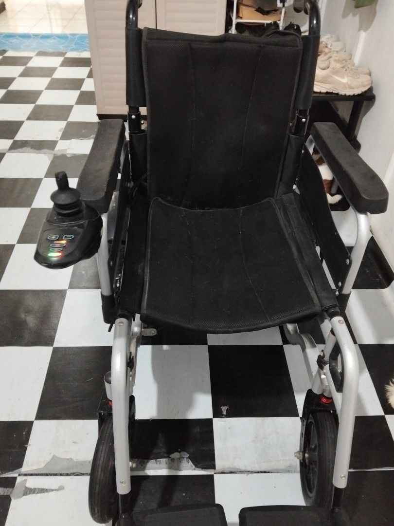 Electric wheel chair (Category: Caregiving Services) located in Abucay. Submitted by zealtree.b8f60f (Listing ID 1458810485, Image 1). Description: good as new 😊.