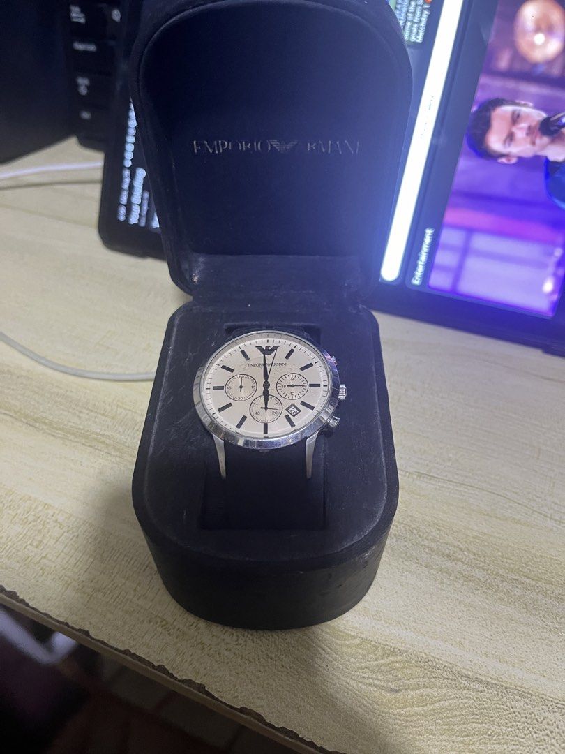 Emporio Armani Chronograph Watch (Category: Men's Watches) located in Manila. Submitted by jankbaiteh05162 (Listing ID 1458859140, Image 2). Description: -replace strap light scratch sa glass di halata - Emporio Armani Watch - Cream Dial - Chronograph Function - Date Display - Black Rubber Strap - Original Box Included - Versatile for everyday or formal wear.