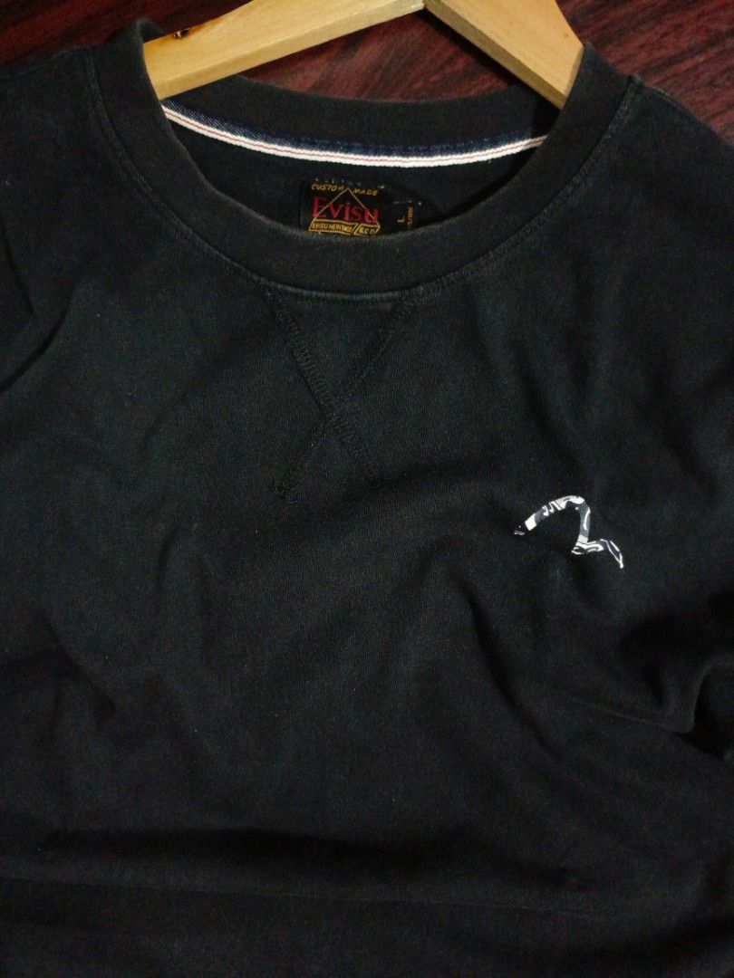 EVISU Daicock Black Shirt (Category: Tshirts & Polo Shirts ) located in Munoz. Submitted by aj_findss (Listing ID 1458691512, Image 1). Description: Good Condition Color Rate 9 out of 10 slightly sunfade on neckline Guaranteed Authentic/OG 💯 Size Large Measurements - (inches) - Width 21 - Length 28 Shipping via J&T / LBC Shipping fee not included Mode of payment 💳 - Gcash Message me for inquiries📲.