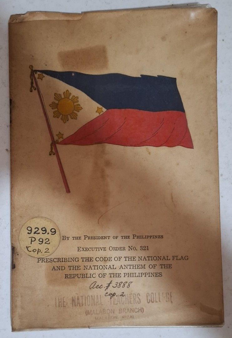 Executive Order No. 321 Prescribing Code of National Flag & Anthem (Category: Textbooks) located in Caloocan City. Submitted by oldbestseller72 (Listing ID 1458722019, Image 1). Description: - Features Executive Order No. 321 by the President of the Philippines. - 10 pages - Details the code for the national flag and anthem. - Includes a section on the evolution of the Filipino flag..