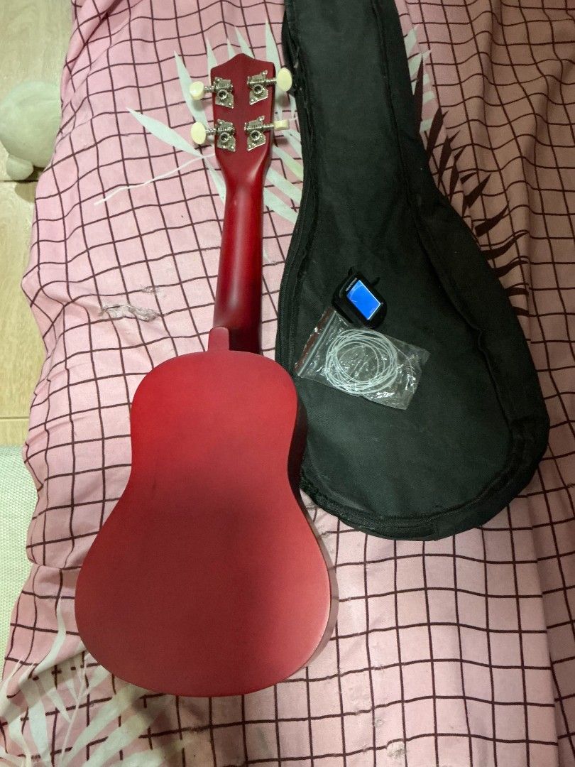 FOR SALE: UKULELE Heart String (Category: Musical Instruments) located in Manila. Submitted by monicafulg07442 (Listing ID 1458755910, Image 3). Description: Super new, hindi nagamit as in inclusion: Tuner Free string And bag.