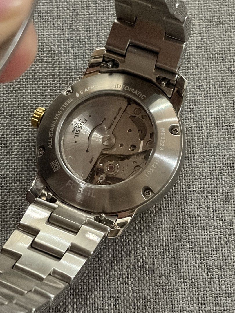 Fossil Heritage Automatic Watch Two-Tone Stainless Steel (Category: Men's Watches) located in Santo Tomas. Submitted by kencrngl (Listing ID 1458693722, Image 3). Description: - Fossil Heritage Automatic Watch - Two-tone stainless steel band (gold and silver) - See the automatic movement through the case back - Water resistant up to 5 ATM - Model: ME3228 -38mm - Comes with original Fossil Heritage box.